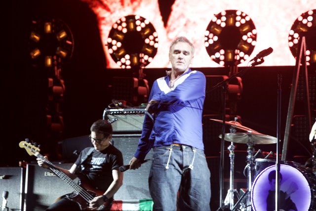 Morrissey rocks the stage with his guitar