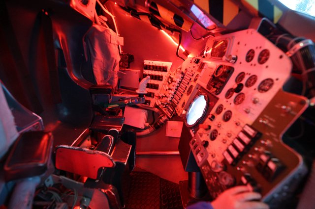 Apollo Command Module Interior Bathed in Red Light