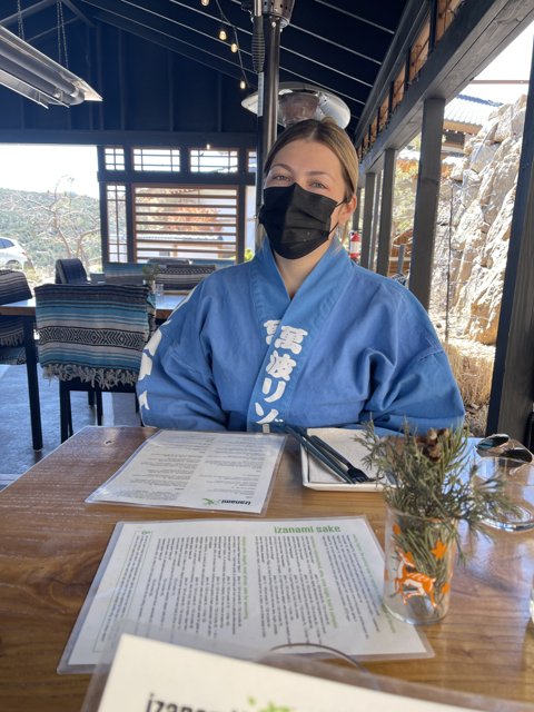 Masked Woman at a Dine-in Restaurant