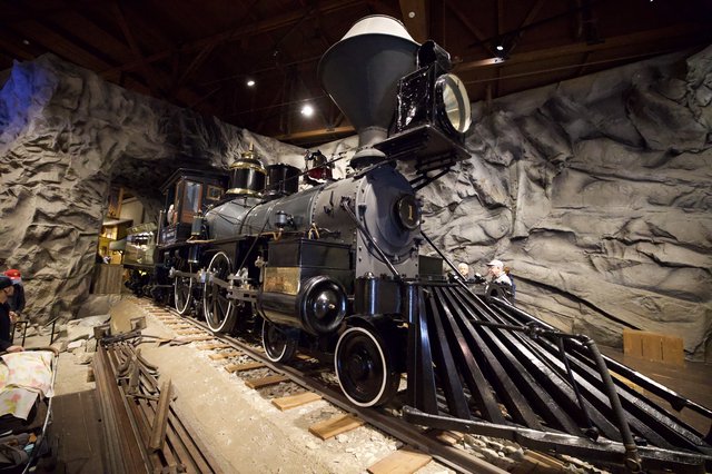 Vintage Steam Locomotive Display in Museum Cave Setting