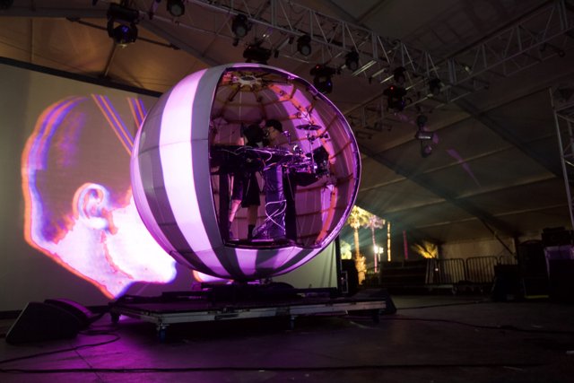 Purple Sphere Illuminates Coachella Crowd