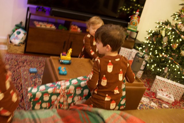 Christmas Morning with Children Opening Presents