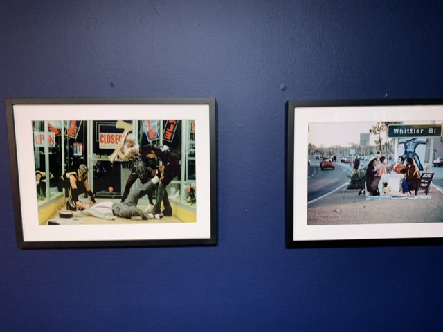 Framed Photographs in Blue Room