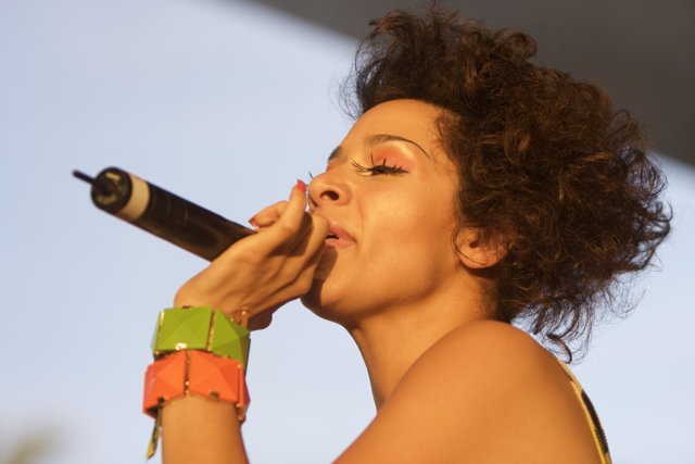 Captivating Performance by Curly-haired Singer