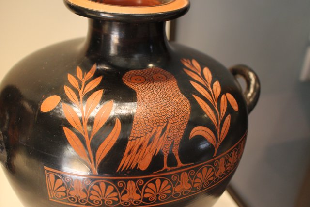 Owl-adorned Pottery Vase
