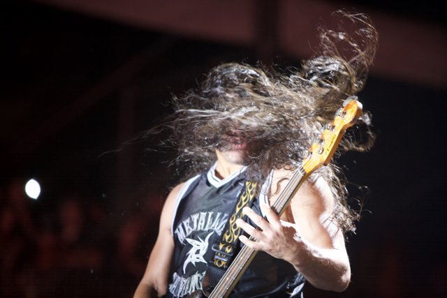 The Guitarist with Flowing Locks