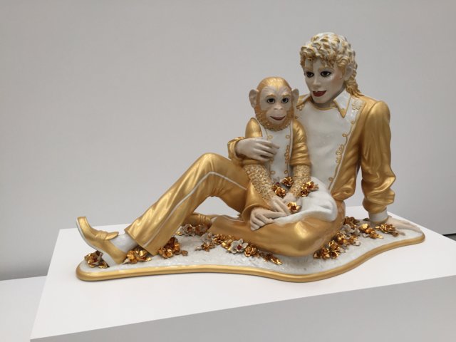 Man and Monkey Figurine