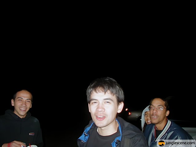Three Men Enjoying the Night Sky