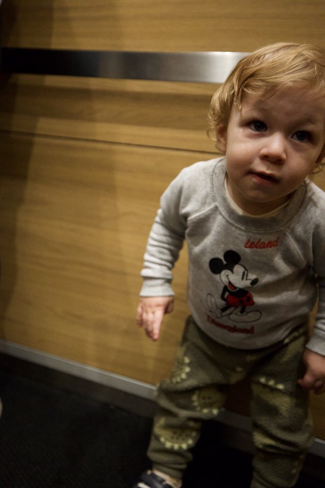 Curious Toddler in Mickey Mouse Shirt