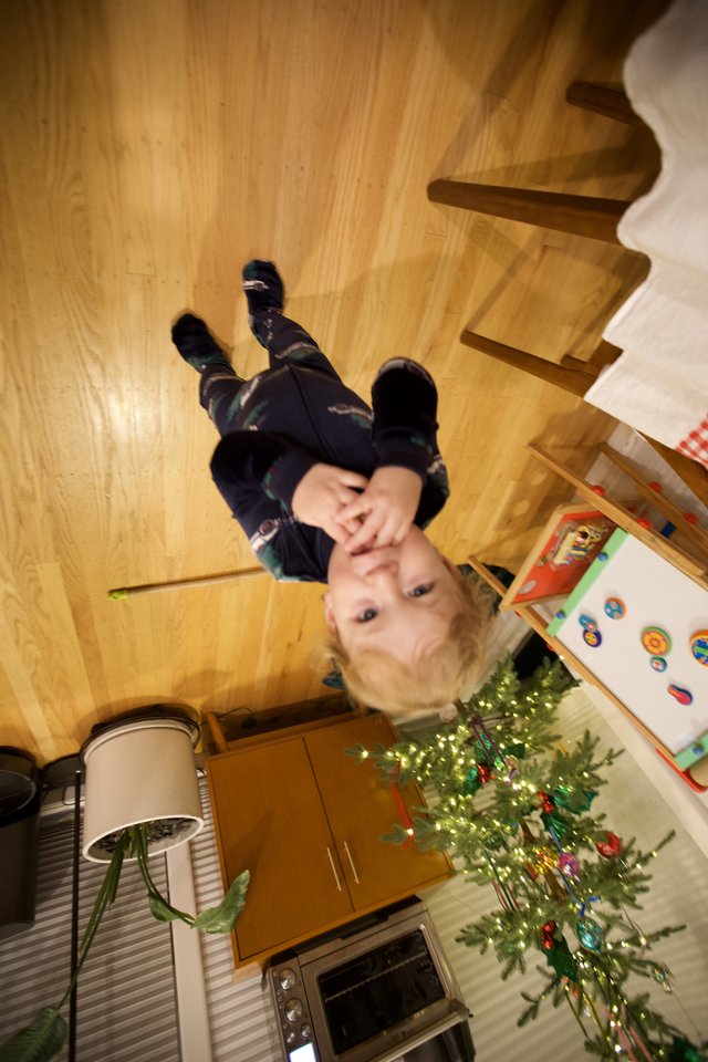 Child Playing on Christmas Morning at Home