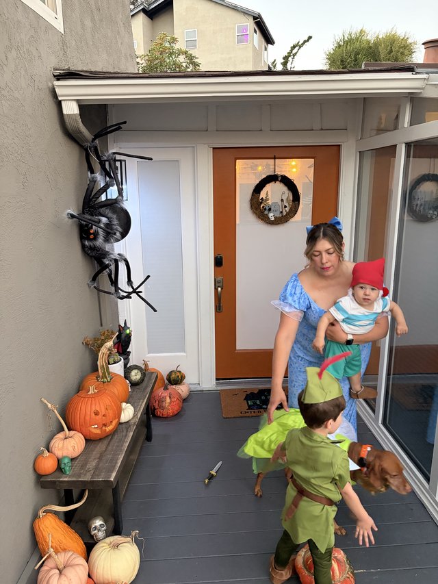 Halloween Porch Scene with Family in Costume