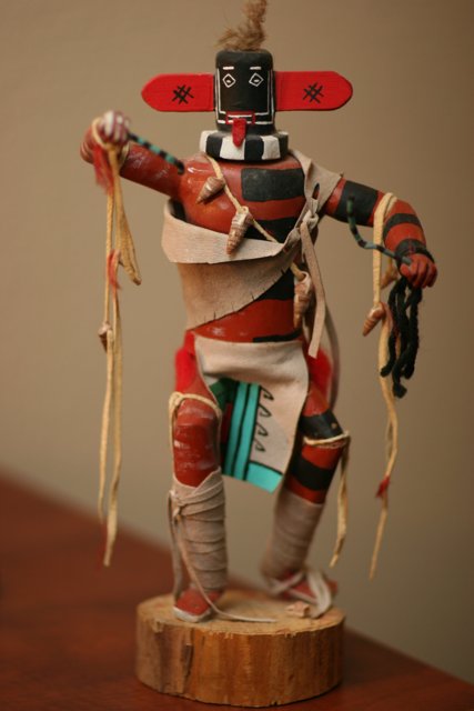 Native American Figurine with Striking Headdress