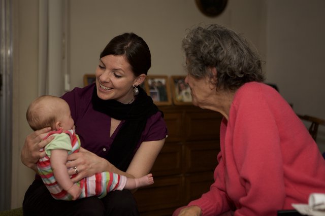 Three Generations Share a Tender Family Moment