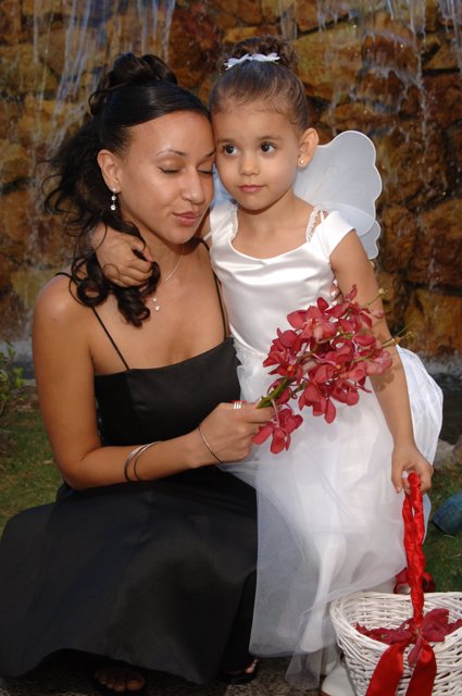 Beautiful Bride and Flower Girl at Outdoor Wedding