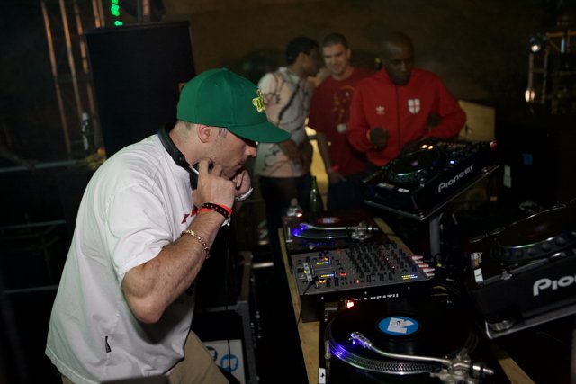 DJ Lenny R in a Green Baseball Cap