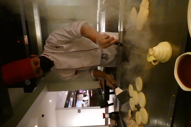 Japanese Teppanyaki Chef Cooking Behind Mask