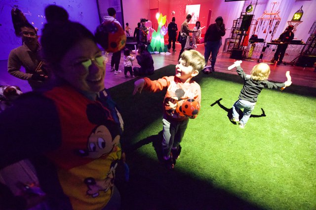 Children Dancing at Colorful Baby Rave Event
