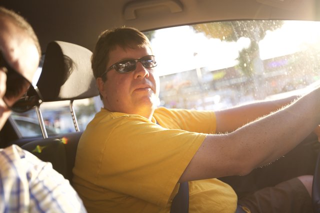 Golden Hour Drive: Man Behind the Wheel