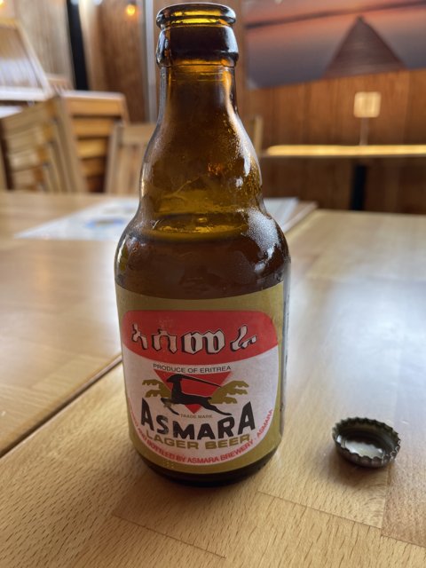 Asha Beer on a Table
