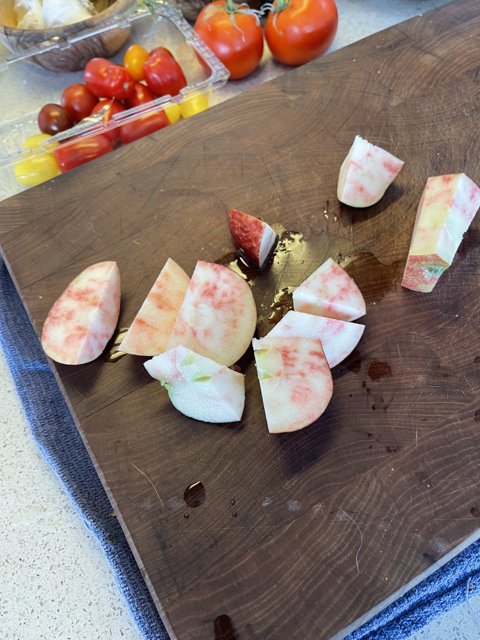 Freshly Sliced Summer Produce on a Cutting Board