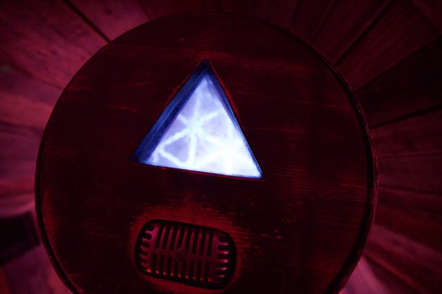 Illuminated Triforce Symbol in Crimson Chamber