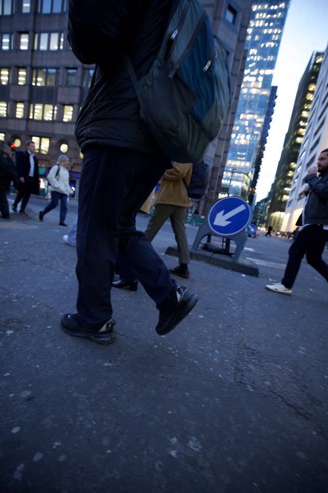 Urban Commuters at Dusk in City Financial District