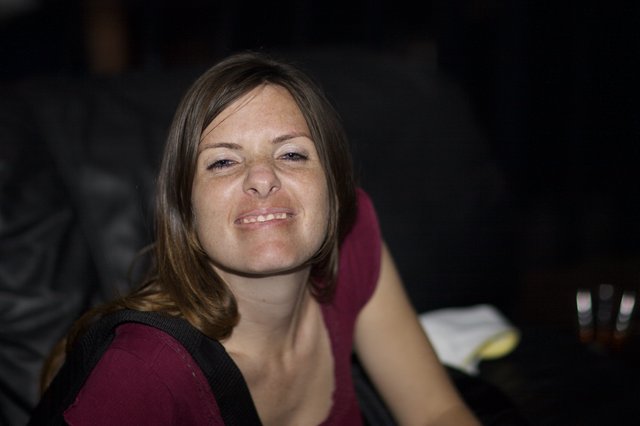 Candid Smile at a Night Venue Event