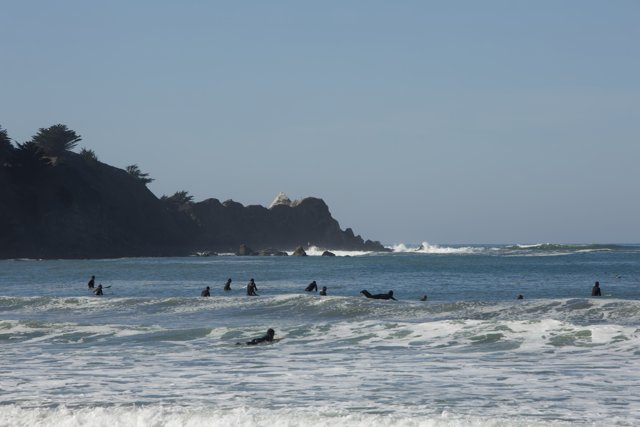 Pacifica Surfers Catching Waves