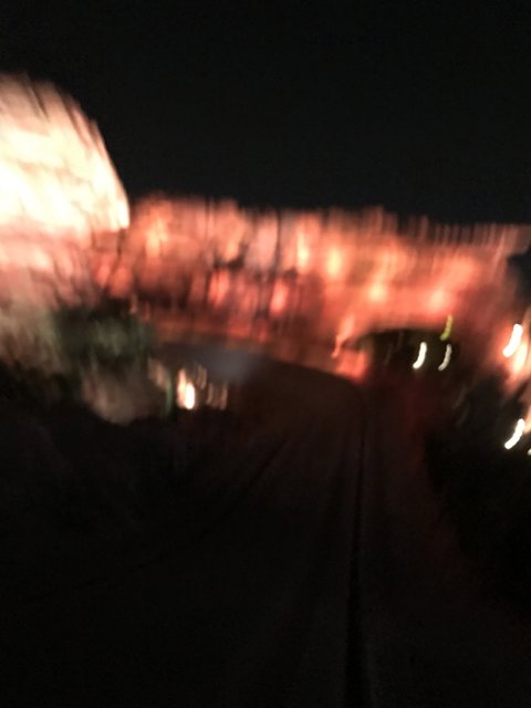 Blurred Train under Night Sky