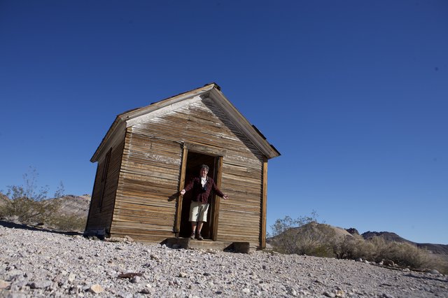 Explorer at Abandoned Desert Ghost Town Shack