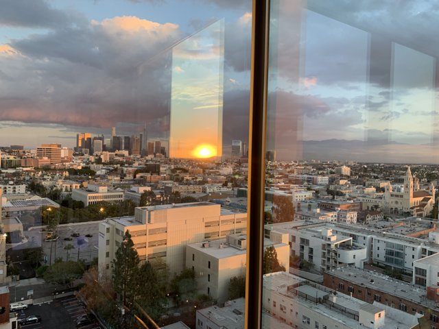 Sunset's Embrace on the Metropolis