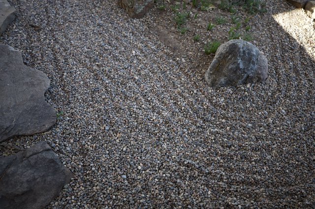 Zen Garden with Gravel and Natural Stone Elements