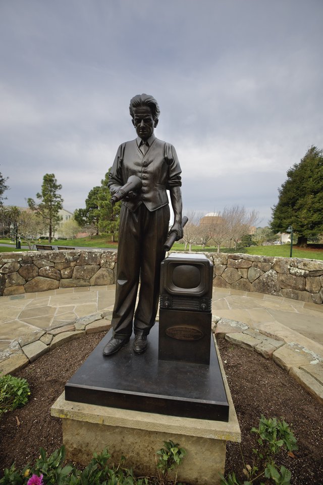 Bronze Statue Commemorating Television Pioneer with Vintage TV Set