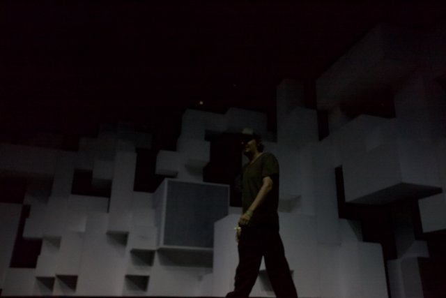 Standing Before the Cube Wall