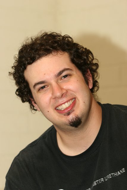 Happy Male Portrait with Curly Hair