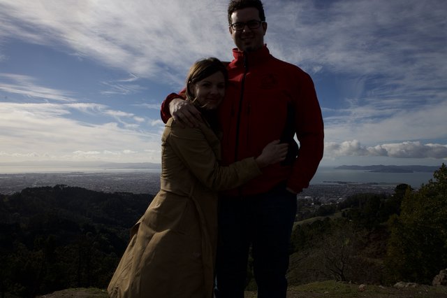 Couple Embracing at Scenic Bay Overlook