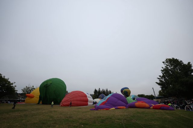 Hot Air Balloons Inflating at Dawn Balloon Festival
