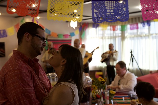 Couple Dancing at Vibrant Mexican Fiesta Celebration