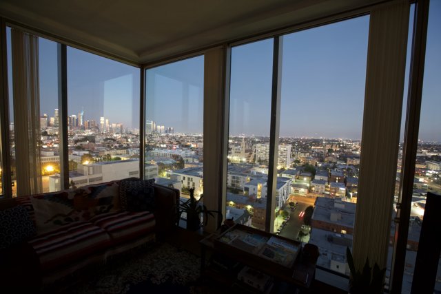 Urban View from a Penthouse Living Room