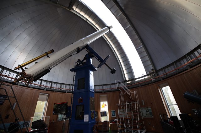 Historic Refracting Telescope in Observatory Dome