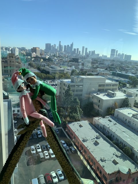 Elf on the Shelf overseeing the Metropolis