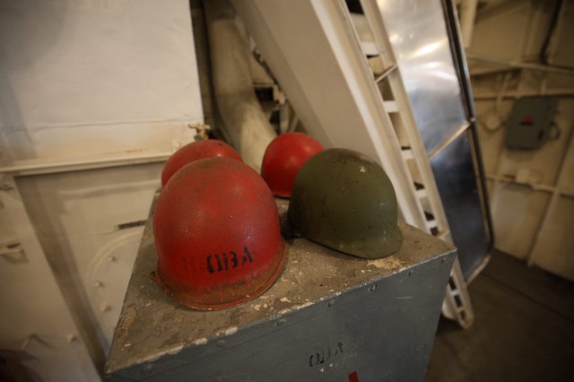 Vintage Hard Hats in Industrial USS Hornet Interior