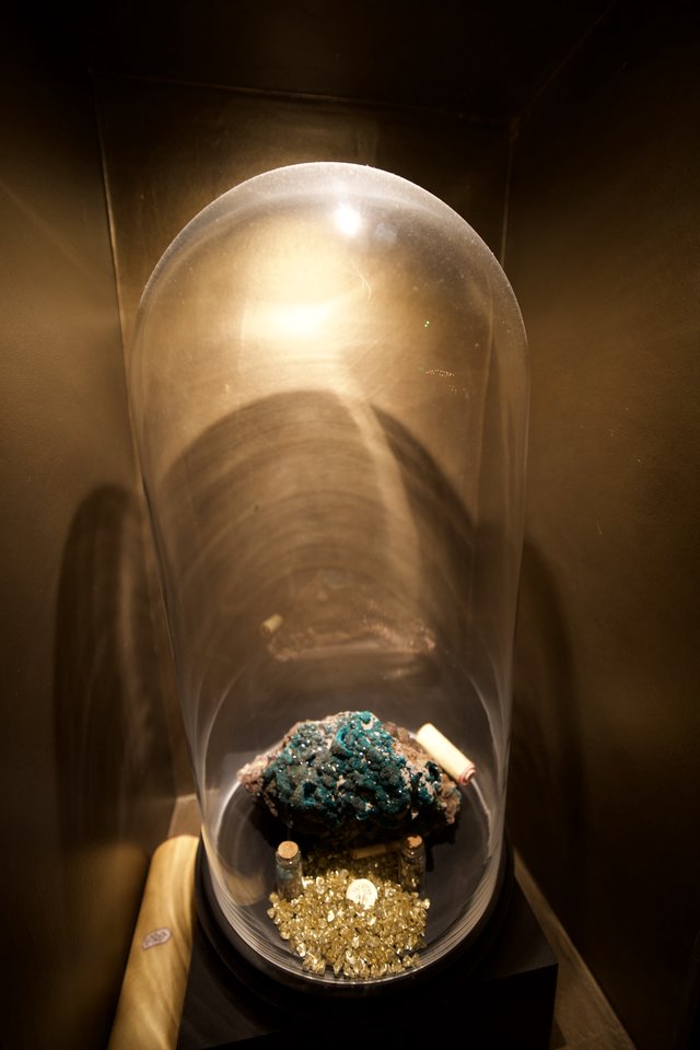 Turquoise Mineral Specimen Under Glass Dome Display