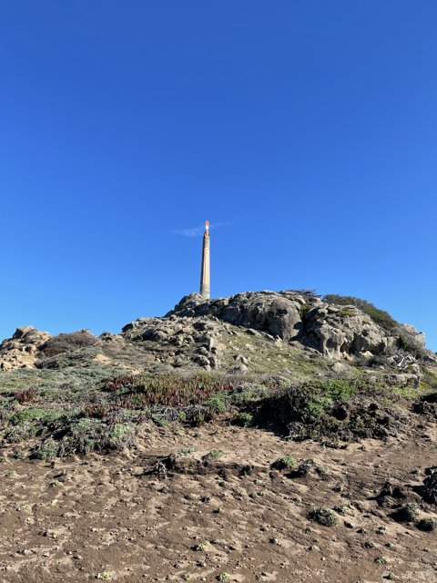 Towering Beacon on a Hill