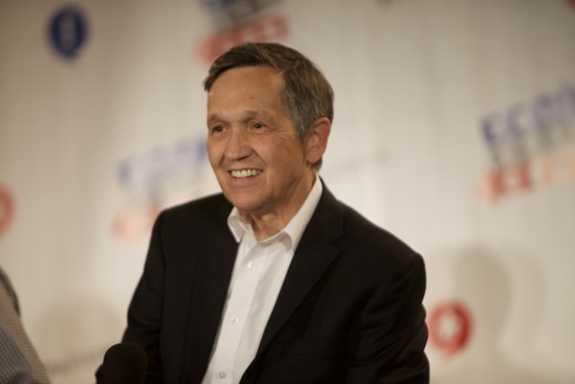 Smiling Politician at a Press Conference