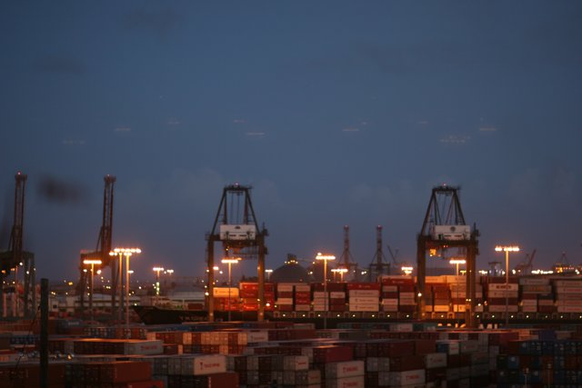 Nighttime Cargo Ships at the Waterfront