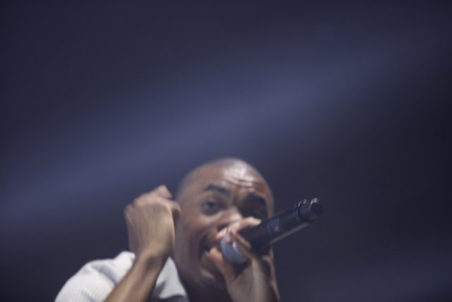 Vince Staples Takes the Stage with Microphone in Hand