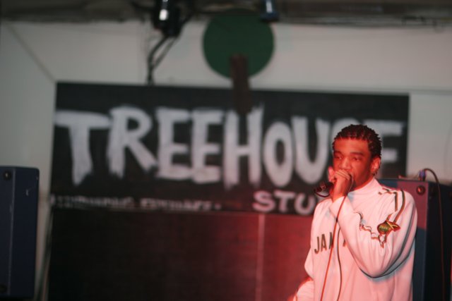 Chris L Performing with Microphone