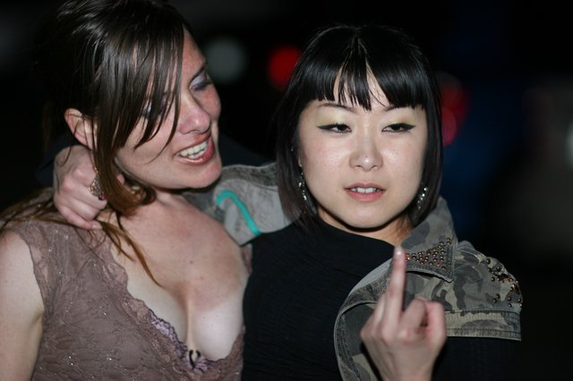 Two Women Posing at Nightclub Party Event 2006