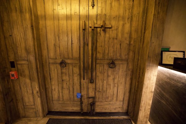 Rustic Wooden Double Doors with Traditional Hardware